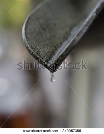 stock-photo-water-droplet-dripping-out-of-roof-gutter-2499573551.jpg